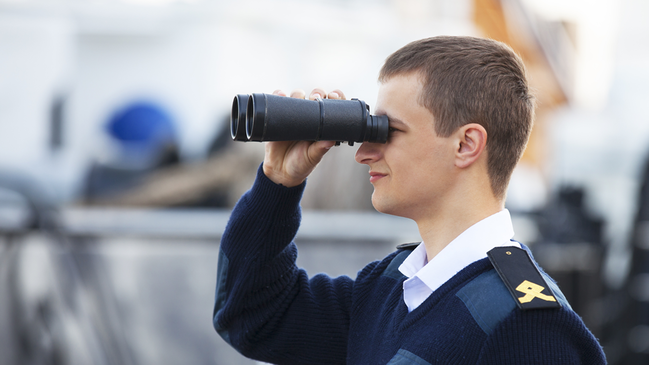 Man with binoculars (refer to: Maritime Security)