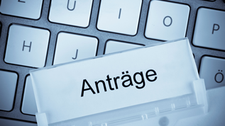 verweist auf: Aktualisierung der Antragsmaske im ELAN-K2 Ausfuhr-System
  Aufgeschlagenes Gesetzbuch (verweist auf: Aktualisierung der Antragsmaske im ELAN-K2 Ausfuhr-System
 )