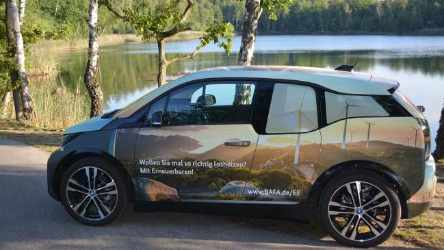 BAFA Elektroauto mit dem Spruch: Wollen Sie mal so richtig losheizen? Mit Erneuerbaren! BAFA Elektroauto mit dem Spruch: Wollen Sie mal so richtig losheizen? Mit Erneuerbaren!